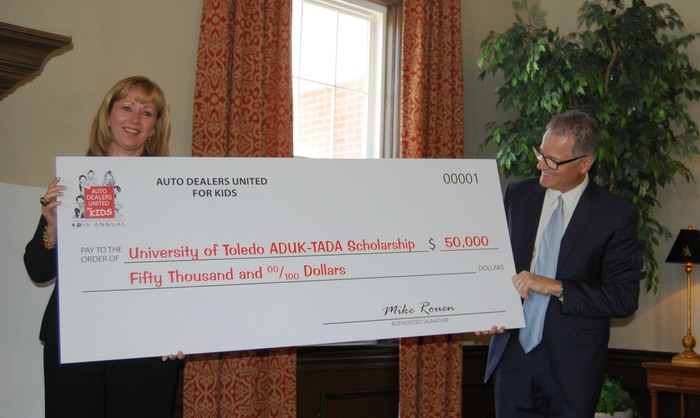 The University of Toledo receives their check for the ADUK-TADA Scholarship Endowment